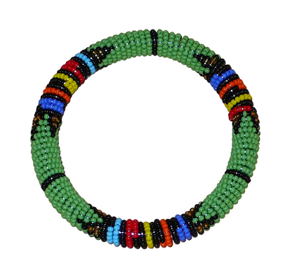 Bracelet africain tubulaire à motifs tribaux zoulous fait de perles de rocaille vertes et multicolores glissées sur du fils de nylon enroulé autour d'un tube en plastique.
Ce bracelet a une circonférence de 21 cm, un diamètre de 6.5 cm et une épaisseur de 1 cm.
Il peut être porté par une femme ou par un homme.