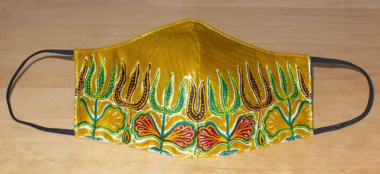 Masque facial en tissu africain moutarde et multicolore