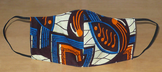 Masque facial pour homme en tissu africain en coton imprimé de motifs ethniques ; il se porte avec des élastiques. En vue d'une utilisation éco-responsable, ce masque est lavable et réutilisable.

Il mesure 21 cm de long, et 40 cm en comptant les élastiques ; il a une hauteur de 12 cm (du haut du nez jusqu'au menton) et une largeur sur les côtés de 8 cm.